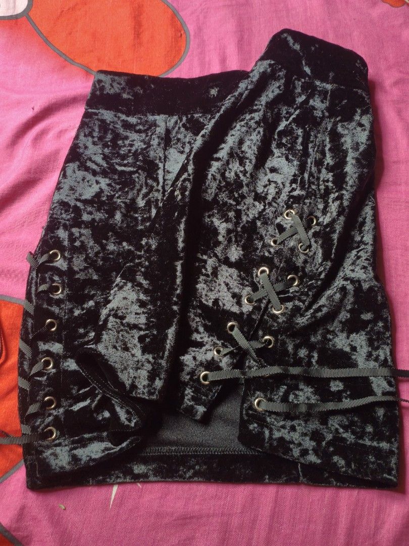 velvet mini skirt (Category: Skirts) located in Manila. Submitted by avwilynn (Listing ID 1469600728, Image 3). Description: *Black Crushed Velvet Lace-Up Mini Skirt - Size M* Retro / goth style mini skirt. *Details:* - *Brand:* Retrogirl / Heyyou Girl - tag says M - *Color:* Black crushed velvet - shiny velvet texture, shows some light reflection in photos which is normal for this fabric - *Cut:* High-waisted, bodycon / pencil fit, mini length -