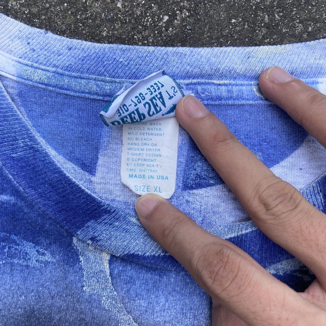 Vintage 1990’s AOP Deep Sea Tee (Category: Tshirts & Polo Shirts ) located in Angeles City. Submitted by eriellynnthrifts (Listing ID 1469683892, Image 3). Description: 24x30 XL on tag Good Condition. See photo for details 440 Angeles City Pampanga.