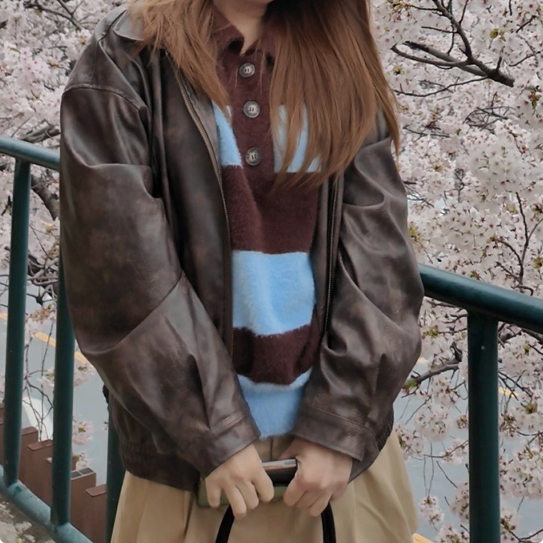 Vintage Brown Oversized Leather Bomber Jacket (Category: Coats, Jackets and Outerwear) located in Manila. Submitted by rldn.alli (Listing ID 1469660998, Image 1). Description: - Style: Vintage brown leather bomber jacket with a relaxed, oversized fit - Details: Features a soft textured finish with ribbed hem and cuffs - Closure: Full front zipper - Season: Great layering piece for cooler weather - Condition: Excellent vintage condition.