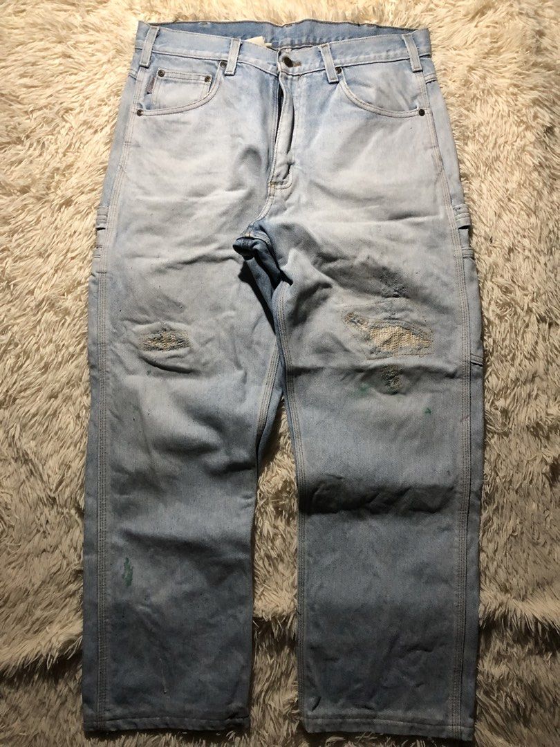 Vintage Carhartt Double Loop Workwear Condi Carpenter Pants (Category: Jeans) located in Maria Aurora. Submitted by kylerikathriftshop101010 (Listing ID 1469715008, Image 3). Description: 33-34 38 length 8 hem altered, paint stain,repairs, changed patch kase nasira na kase dati syang leather patch - Brand: Carhartt - Style: Vintage light wash denim work pants with carpenter pockets and hammer loop - Closure: Button fly with sturdy belt loops - De