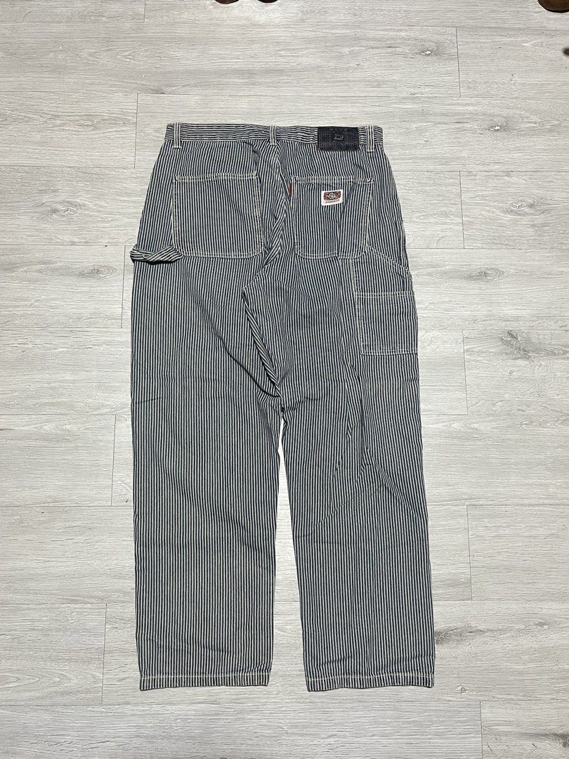 Vintage Hickory Stripe Carpenter Overalls Pants (Category: Jeans) located in Manila. Submitted by jorgemabelin2001 (Listing ID 1469605243, Image 2). Description: - Classic blue and white hickory stripe design - Heavy-duty utility style with multiple patch pockets - Functional side hammer loop and button fly - Detailed with a back pocket woven patch and vintage waistband label - Sturdy workwear construction with contrast white stitching - Conditio