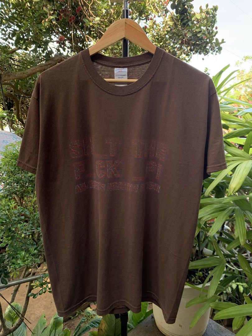 Vintage late 1990s/Y2K STFU parody statement tee (Category: Tshirts & Polo Shirts ) located in Cagayan de Oro. Submitted by premium_thrifts (Listing ID 1469586564, Image 2). Description: Brown colorway. Used condition. Double stitch on both sleeves and hem Fits Large L29" x W22" 20" (shoulder to shoulder) 7.5" (sleeve length) Issue: faded print, and crackprint Add shipping fee (via JRS or J&T).
