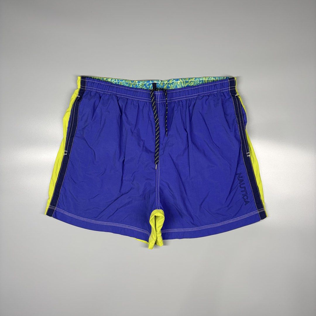 Vintage Nautica With Inner Mesh (Category: Activewear) located in Cavite. Submitted by onebeancent (Listing ID 1469719830, Image 2). Description: Size: Large (34 to 40 Waistline) Dimension: 16" Length (Above the knee) Color: Blue & Lime Color Rate: 10/10 Issue: None Condition: Like new‼️ Price: 780php Additional Shipping Fee (J&T Small Pouch) 75php Luzon 100php visayas 120php mindanao.