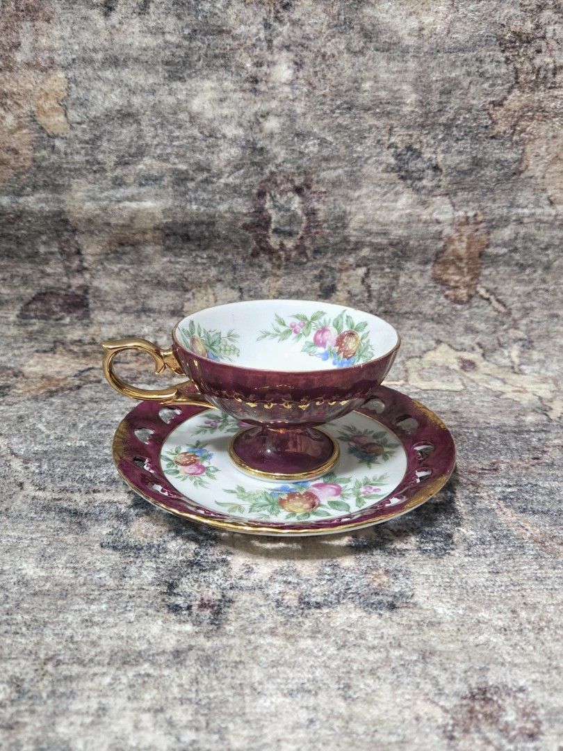 Vintage Pearlized Cup and Saucer (Category: Coffee & Tea Tableware) located in Manila. Submitted by cwknds (Listing ID 1469745703, Image 2). Description: vintage iridescent pearlized fine porcelain cup and pierced saucer by ohashi china. rich maroon glazed body with elaborate gilt trim, pedestal foot, and handpainted garland interior. • size reference height is 14cm ~ personally sourced&curated note: these are vintage pieces hence may show signs 