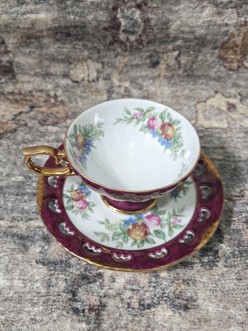 Vintage Pearlized Cup and Saucer (Category: Coffee & Tea Tableware) located in Manila. Submitted by cwknds (Listing ID 1469745703, Image 3). Description: vintage iridescent pearlized fine porcelain cup and pierced saucer by ohashi china. rich maroon glazed body with elaborate gilt trim, pedestal foot, and handpainted garland interior. • size reference height is 14cm ~ personally sourced&curated note: these are vintage pieces hence may show signs 