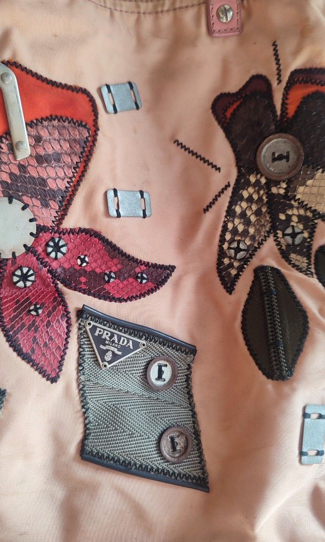 Vintage Prada Tessuto Nylon (Category: Tote Bags) located in Marikina City. Submitted by adzie05 (Listing ID 1469582657, Image 2). Description: Vintage Prada Tessuto Nylon Patchwork Applique Tote Bag Some minor yellow stains.. Really cute in actual! Price is still negotiable for sure buyer..