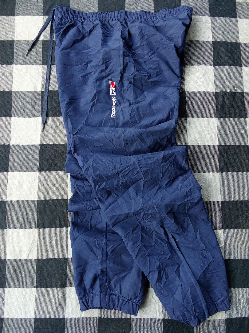Vintage Rebook track pants (Category: Joggers) located in Polomolok. Submitted by timog_high_ice (Listing ID 1469643670, Image 1). Description: - Excellent - Large on tag - Waist 32-34 - Length 41 Minimal Lints Solid nito 🫶.