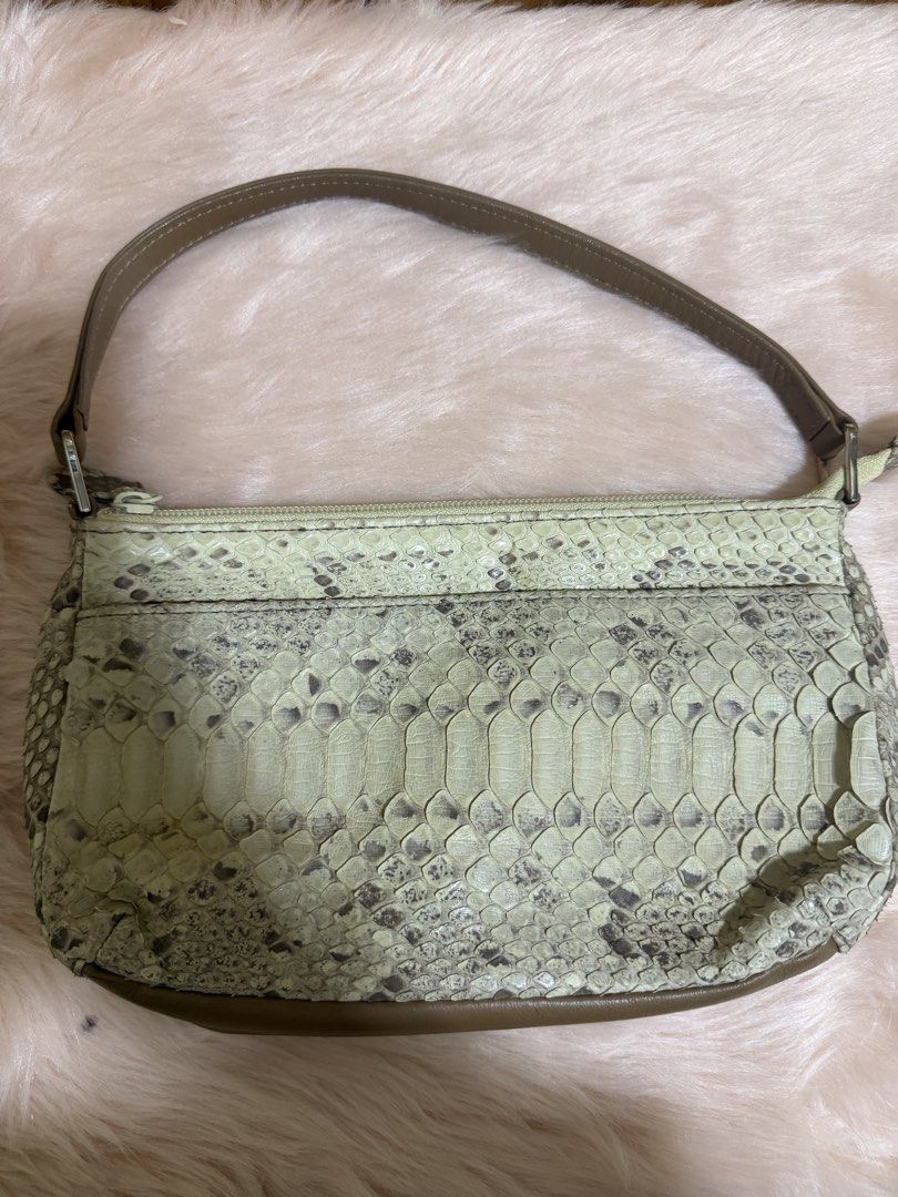 Vintage Sage tan Python-Print Shoulder Bag (Category: Shoulder Bags) located in Taguig. Submitted by titanars (Listing ID 1469596515, Image 1). Description: • Style: Y2K Baguette / Shoulder Purse • Details: Features an exotic faux-python scaled texture in light mint/sage green, paired with a solid olive brown leather strap and bottom base. Silver-tone hardware accents. • Condition: Pre-loved in great condition. Clean interior, smooth working zipp