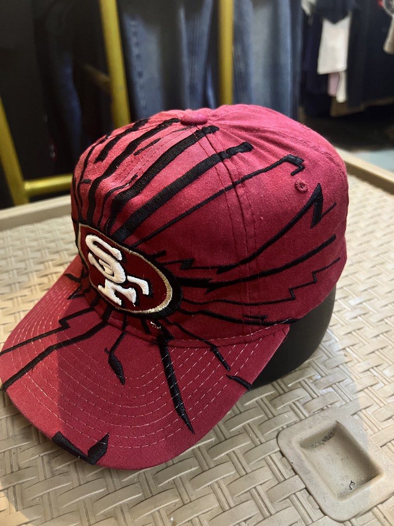 Vintage San Francisco 49ers Starter Snapback Hat (Category: Caps & Hats) located in Manila. Submitted by irenekaren57943 (Listing ID 1469591679, Image 2). Description: - Brand: Starter (NFL Pro Line) - Team: San Francisco 49ers - Color: Maroon with unique black shatter/crack embroidery across crown and brim - Details: Embroidered team logo on front, Starter logo on back, and NFL Pro Line patch on side - Closure: Adjustable matching maroon plastic