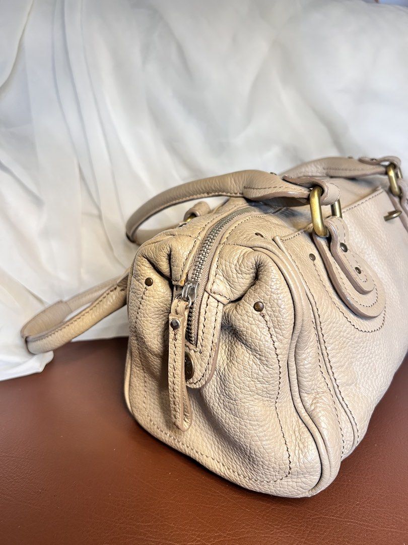 VINTAGE SLOUCHY LEATHER SHOULDER BAG (Category: Shoulder Bags) located in Baguio. Submitted by chmlnstudios (Listing ID 1469664267, Image 3). Description: VINTAGE SLOUCHY LEATHER SHOULDER BAG / BOWLING BAG CODE: C11-B02 A spacious, Y2K-inspired slouchy shoulder bag in a versatile beige / warm nude shade. Crafted from pebbled leather with antique brass hardware accents and Chloe-style padded handle details, making it an effortless daily statement 