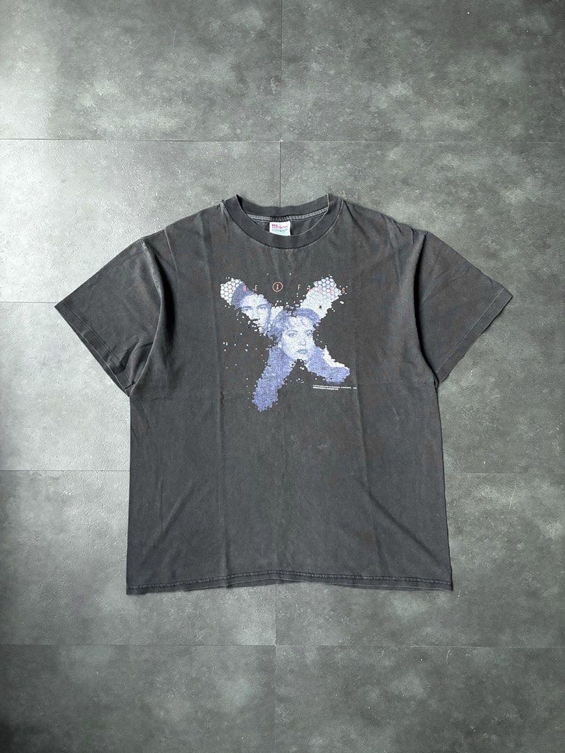 Vintage X Files Tee Shirt (Category: Tshirts & Polo Shirts ) located in Cabuyao City. Submitted by hesovint. (Listing ID 1469685478, Image 1). Description: IG: heso.vint Flaw: signs of use Fits: L width: 22 length: 28 sleeve (pit to cuff): unit: inches +sf.