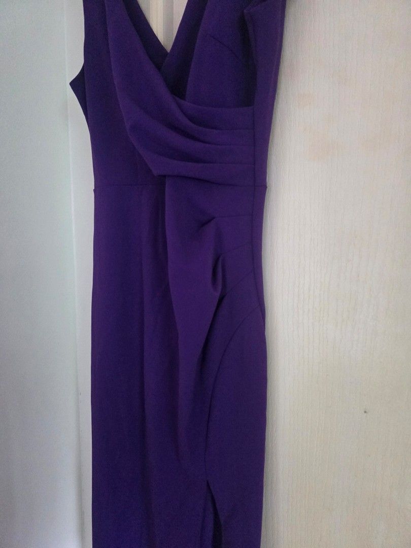 Violet long sexy gown (Category: Evening dresses & gowns) located in Cavite. Submitted by rydes_clo (Listing ID 1469630561, Image 1). Description: ang ganda ng tela stretchy ang lakas maka star of the night hindi lalabas ang bilbil may pa slit ganda neto promise 10/10 pa ang condition L - xl.