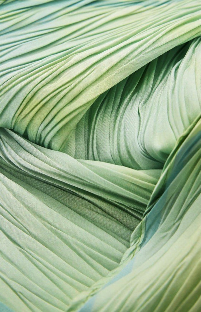 Watercolor Gradient Scarf (Category: Scarves) located in Taguig. Submitted by lrichdeclutters.mnl (Listing ID 1469604561, Image 3). Description: - Design: Green and blue gradient with scattered yellowish color accents - Texture: Soft and lightweight fabric with all-over fine pleats - Shape: Diamond-shaped cut for beautiful and effortless draping .