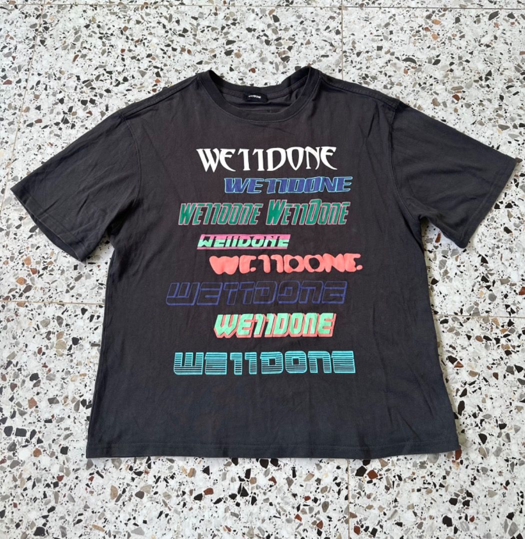 We11done Multi Logo Print T-shirt Dark Grey (Category: Tshirts & Polo Shirts ) located in Davao. Submitted by ithrift2k24 (Listing ID 1469587142, Image 1). Description: - Brand: We11done - Color: Dark Grey - Size: S (tag attached) - Design: Stacked colorful logo prints on the front - Fit: Relaxed short-sleeve - Material: Soft cotton with slight stretch - Condition: Brand tag and wash labels intact - Style: Great for casual streetwear - Dimes 21.5