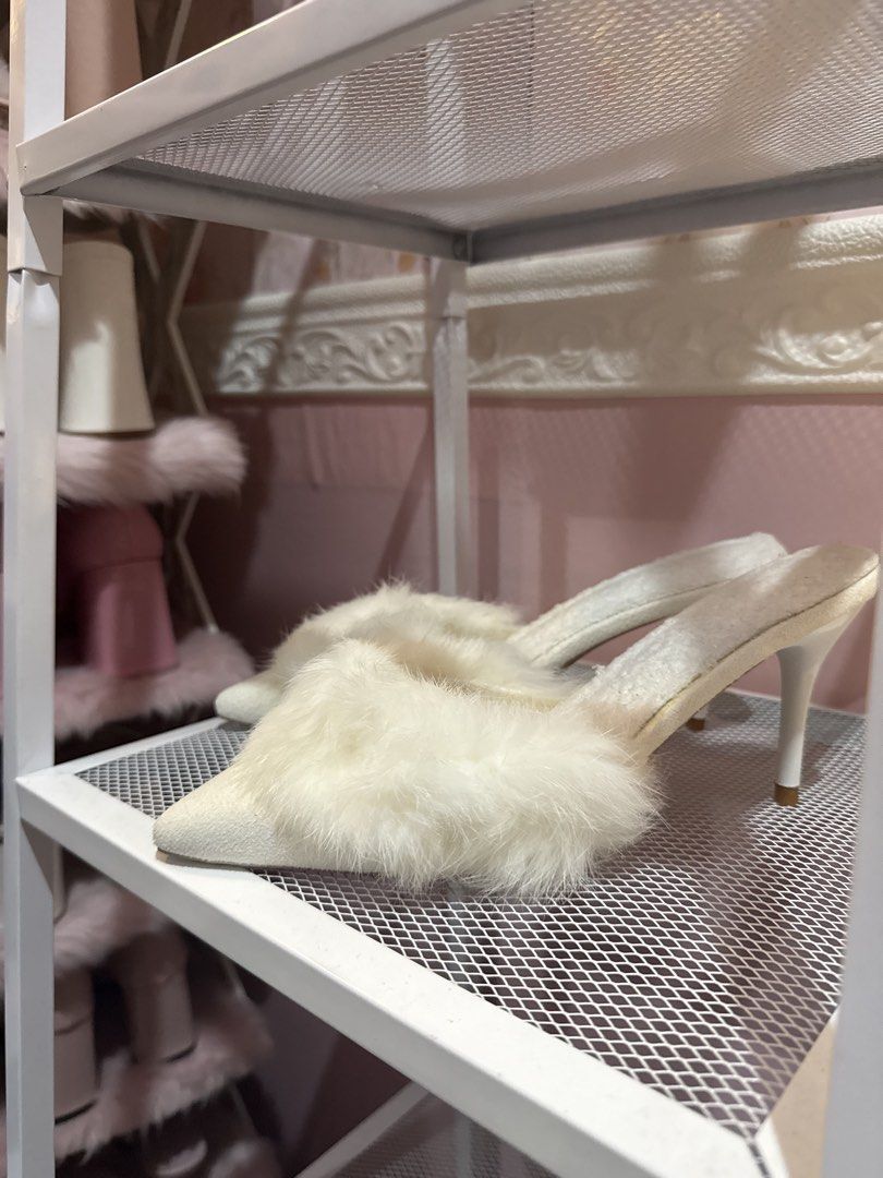 White Furry Pointed Toe Stiletto Mules Heels (Category: Heels) located in Bacoor. Submitted by micsr (Listing ID 1469640027, Image 1). Description: - Color: Clean white - Style: Pointed-toe slip-on mule with slim stiletto heels - Detail: Trendy fluffy faux fur trim across the front - Condition: Excellent, clean insoles and textured upper material - Occasion: Perfect for parties, night outs, or elevating casual outfits With flaws but brandnew neve
