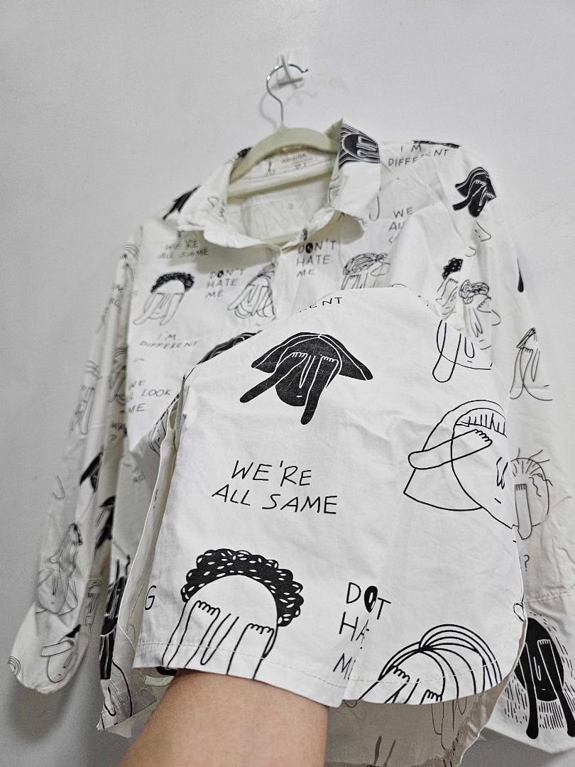 white long-sleeve button-down shirt Abstract design (Category: Longsleeves) located in Los Banos. Submitted by itsmecathey (Listing ID 1469733500, Image 2). Description: It is no longer white na.. it looks dingy and discolored from storage/wear, so it needs a good wash. Im selling it for 100 nalang kayo na po mag wash. Fit to S-M.
