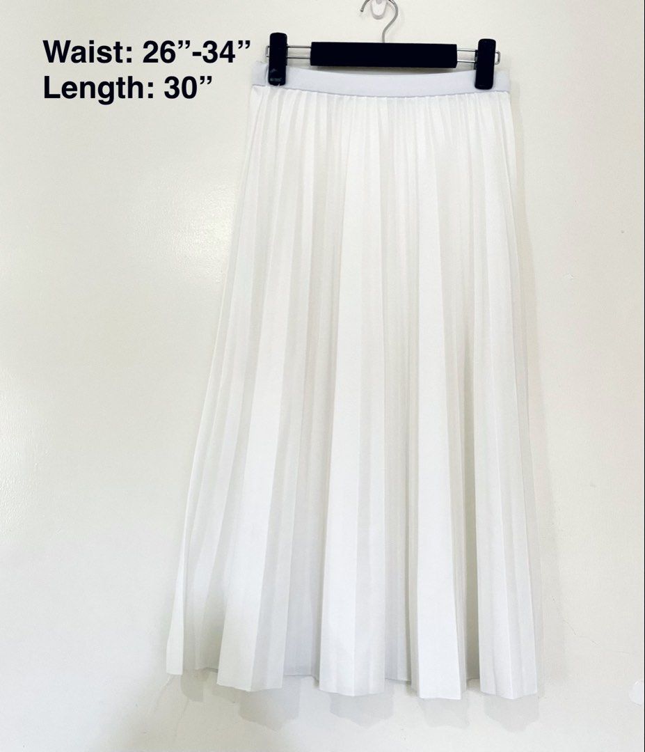White Pleated Midi Skirt (Category: Skirts) located in Mandaue City. Submitted by piacatrina08 (Listing ID 1469632866, Image 1). Description: - Color: White - Style: Pleated midi skirt - Waistband: Elastic, stretches from 26" to 34" - Length: 30 inches - Features: Flowy fabric with clean pleats all around .