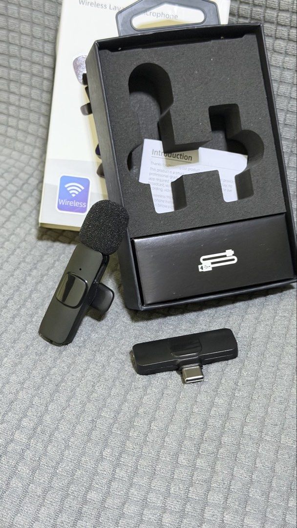 Wireless Lavalier Microphone (Type-C) (Category: Microphones) located in Bacoor. Submitted by ericjim (Listing ID 1469585968, Image 3). Description: - AIODIY K9 Wireless lavalier microphone set for Type-C smartphones - Ideal for live streaming, vlogging, interviews, and short videos - Easy plug-and-play setup directly into your phone port - Includes clip-on mic with foam windshield for clear audio - Complete with original box - Condition: Like ne
