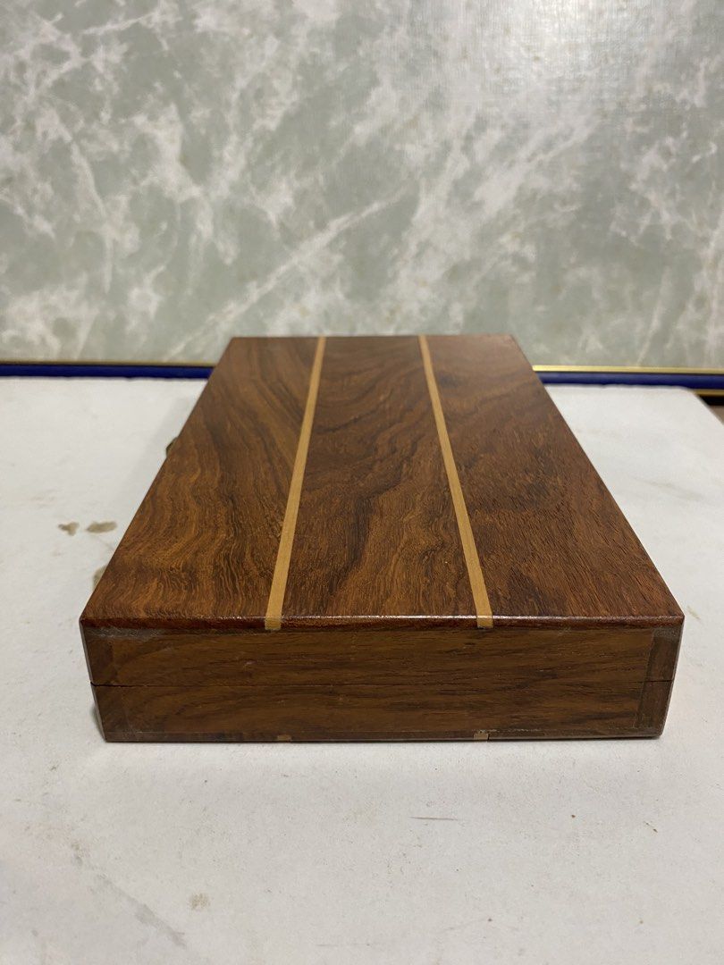 Wooden Backgammon Set Board Game with Dice and Chips (Category: Board Games & Puzzles) located in Calamba. Submitted by chebvintagedepot (Listing ID 1469664700, Image 2). Description: (B18-03) “Wooden folding backgammon board with decorative wood inlay and a traditional design. The board folds for storage and transport, making it suitable for home use or travel. Please note: Missing one white circular checker piece. The set is incomplete. (14/15 