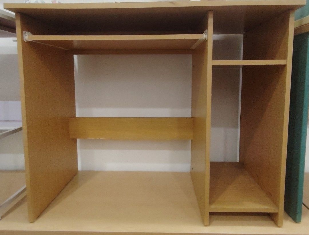 Wooden Study Computer Table (Category: Tables & Sets) located in Kajang. Submitted by adoraaudric (Listing ID 1469731939, Image 1). Description: Wooden Study Computer Table - Material: High density MDF laminated wood - Comes with pull out shelf for keyboard and CPU compartment - Size (approximate) : 2 ½' x 3'. Message for actual measurement - Condition: 8/10 - Sold as is - Self collect at Setia Ecohill Mall. Lalamove can be arranged. AS IS FURNIT