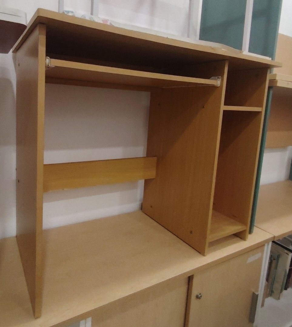 Wooden Study Computer Table (Category: Tables & Sets) located in Kajang. Submitted by adoraaudric (Listing ID 1469731939, Image 2). Description: Wooden Study Computer Table - Material: High density MDF laminated wood - Comes with pull out shelf for keyboard and CPU compartment - Size (approximate) : 2 ½' x 3'. Message for actual measurement - Condition: 8/10 - Sold as is - Self collect at Setia Ecohill Mall. Lalamove can be arranged. AS IS FURNIT
