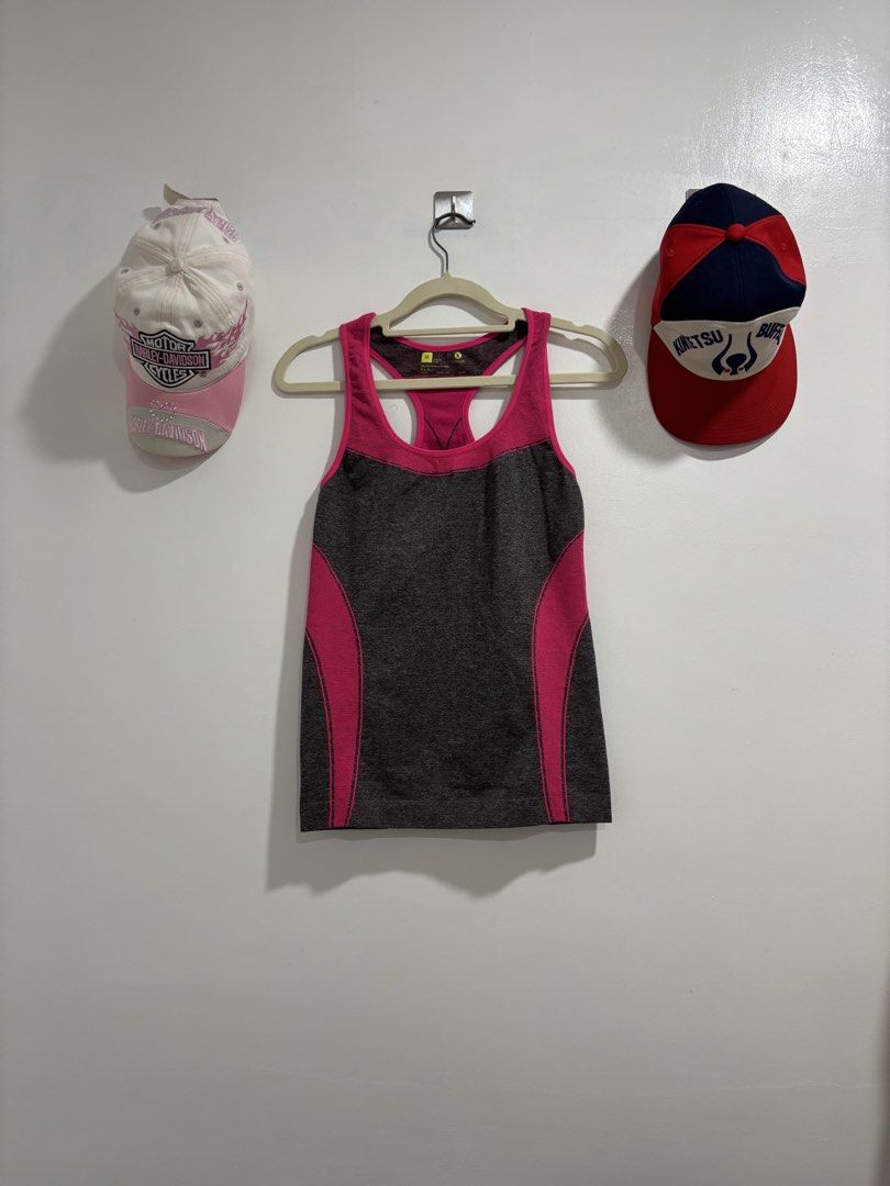 Xersion Athletic Tank Top Grey Pink Size M (Category: Activewear) located in Calbayog City. Submitted by zaxcheus_castillo1708 (Listing ID 1469673944, Image 1). Description: - Brand: Xersion - Size: M - Color: Grey with bright pink contrast panels - Material: 96% polyester, 4% spandex - Style: Racerback activewear tank top - Ideal for: Gym workouts, running, and sports.