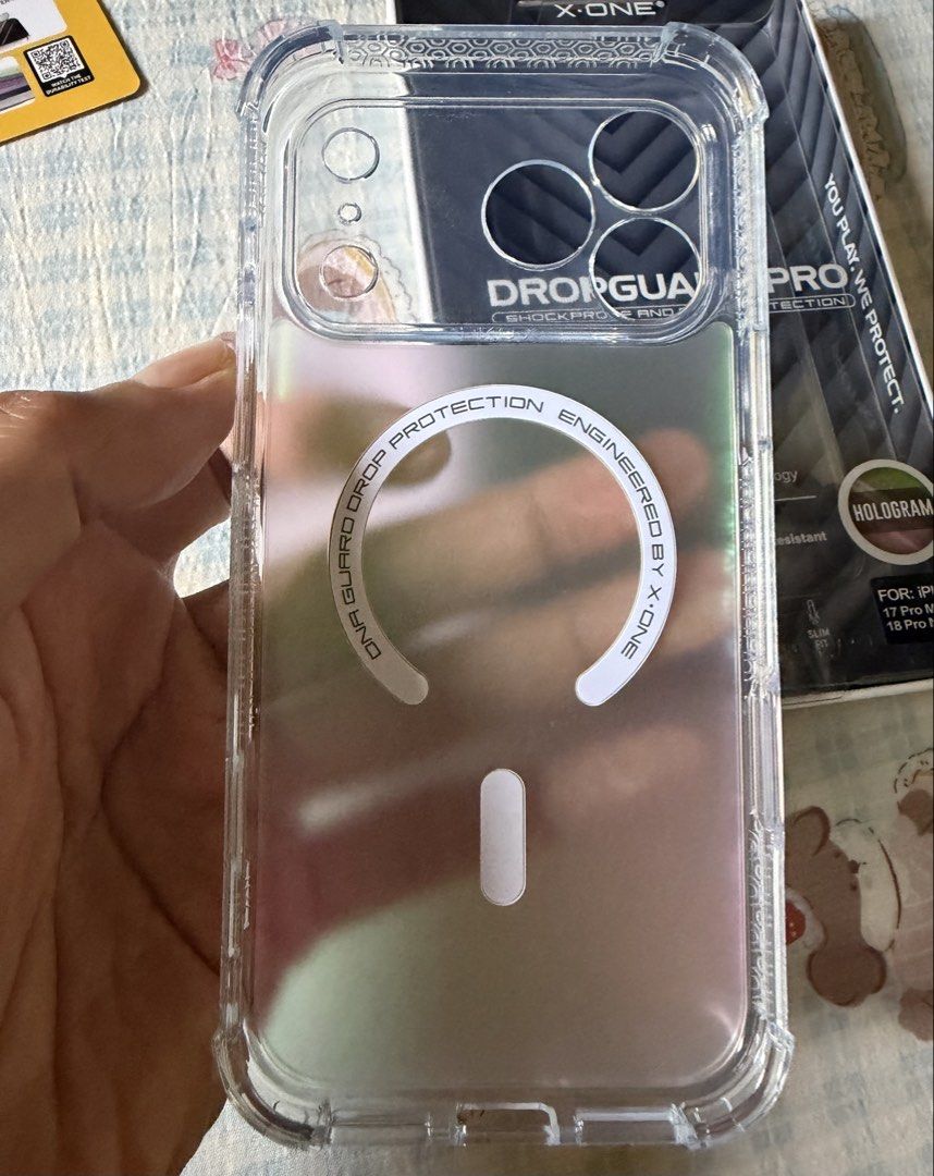 X-ONE DRPOGUARD PRO (Category: Cases & Covers) located in Taguig. Submitted by nakiash (Listing ID 1469573728, Image 3). Description: 📱 FOR SALE: X.ONE DROP GUARD PRO (ORIGINAL) 💰 Original Price: ₱1,600 🔥 Selling Price: ₱1,400 📌 Condition: Mint condition — like brand new! 📌 Used only twice * ✅ 100% Original X.ONE Drop Guard Pro * 🛡️ 20FT Drop Protection * ✨ Holographic accents * 📸 Camera lens plate and side camera button protection for add