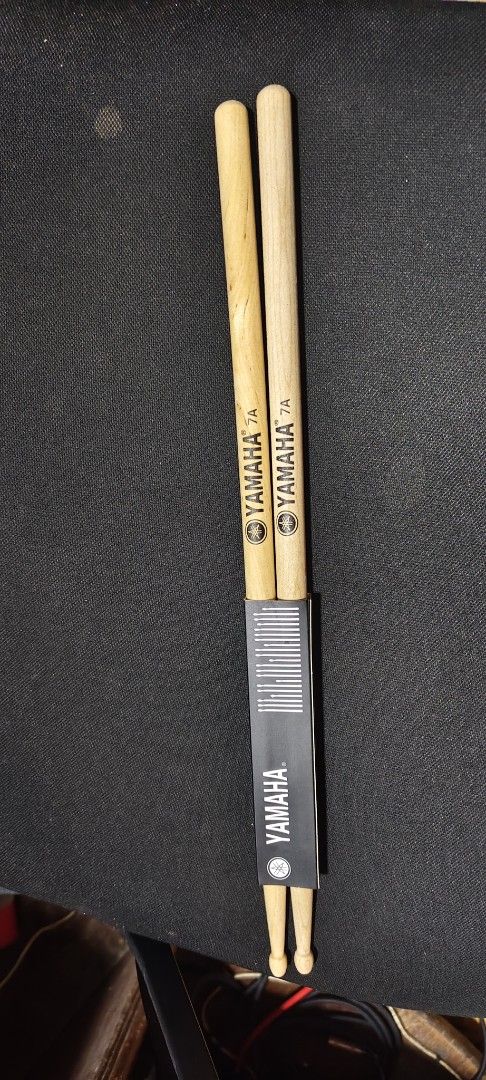 Yamaha 7A Drum Sticks Pair (Category: Musical Instruments) located in Pasig City. Submitted by tupriomichaeljohn (Listing ID 1469732032, Image 2). Description: - Brand new Yamaha 7A drum sticks in packaging - Hand matched pairs, guaranteed straight - Quality wooden construction - Ideal for practice sessions and live gigs - Trusted brand, reliable performance.