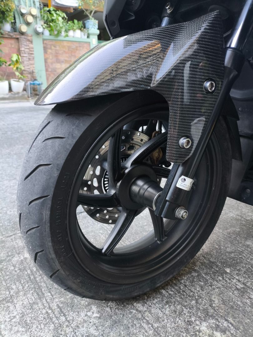 Yamaha NMAX 155 V2 2020 MODEL (Category: Motorbikes for Sale) located in Quezon City. Submitted by jc.ranchus (Listing ID 1469592627, Image 3). Description: FOR SALE: 2020 YAMAHA NMAX 155 V2 💰 ₱90,000 — negotiable upon viewing 📍 Pasig City Selling my Yamaha NMAX with stock engine and the upgrades listed below. No issues and ready for long rides. UPGRADES & ACCESSORIES INCLUDED: ✅ Gren alloy mags ✅ Maxxis tires ✅ Carbon fiber garnish ✅ Loud horn