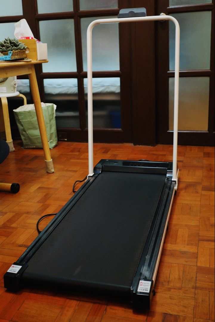 YEESALL Electric Treadmill 3.5HP with Remote Control (Category: Cardio & Fitness Machines) located in Mandaluyong City. Submitted by MarilynsMole (Listing ID 1469614583, Image 1). Description: YEESALL 3.5HP electric treadmill. Folds flat with a white upright handle frame. LED display screen on the base. Includes wireless remote control to adjust speed and settings. Heavy duty black walking belt. Compact size for home workouts. Plug in power cord 