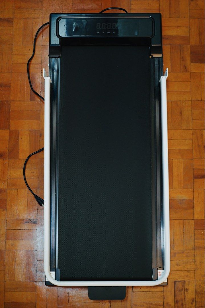 YEESALL Electric Treadmill 3.5HP with Remote Control (Category: Cardio & Fitness Machines) located in Mandaluyong City. Submitted by MarilynsMole (Listing ID 1469614583, Image 3). Description: YEESALL 3.5HP electric treadmill. Folds flat with a white upright handle frame. LED display screen on the base. Includes wireless remote control to adjust speed and settings. Heavy duty black walking belt. Compact size for home workouts. Plug in power cord 