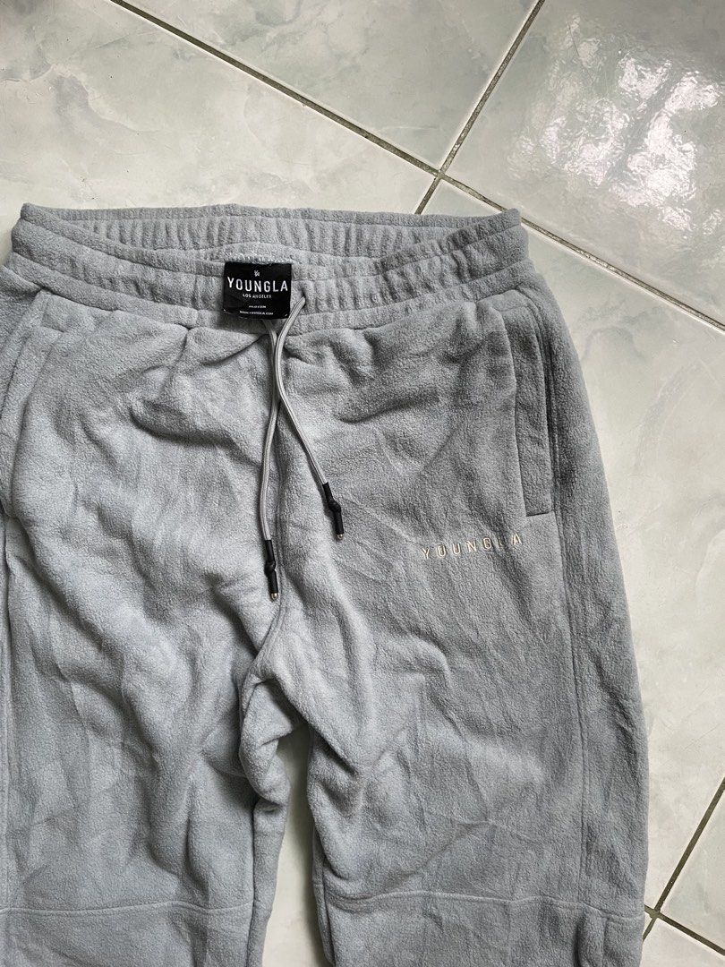 YoungLA Grey Fleece Sweatpants (Category: Joggers) located in Batac City. Submitted by markanthon91935 (Listing ID 1469583137, Image 3). Description: YOUNGLA -800 + SF -Dimes 30-36 x 40 -Good condition -need wash - Brand: YoungLA - Size: Medium - Color: Grey - Ideal for: Gym workouts or casual lounging at home.
