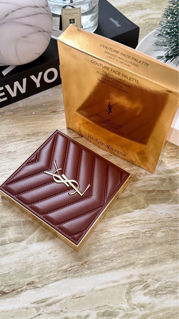 Yves Saint Laurent Couture Face Palette Brewed Reflections (Category: Makeup) located in Leyte. Submitted by modernpersephone (Listing ID 1469647770, Image 2). Description: - Brand: Yves Saint Laurent (YSL) - Item: Couture Face Palette - Shade: Brewed Reflections (great for light to medium skin tones) - Features: Blush and highlighter pans - Packaging: Stunning quilted burgundy leather case with gold hardware - Inclusion: Comes with original gold