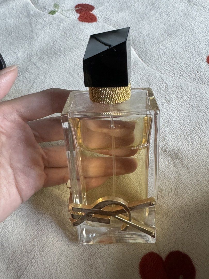 Yves Saint Laurent Libre Eau de Parfum (Category: Fragrance & Deodorants) located in Manila. Submitted by ohashelee (Listing ID 1469638347, Image 2). Description: - Item: YSL Libre Eau de Parfum - Size: Large (approx. 50% remaining) - Design: Iconic gold Cassandre wrap & asymmetric black cap with gold chain - Inclusion: Bottle only (No box) - Note: Great budget-friendly way to test the signature scent Bought in Hongkong 💯 Authentic RFS: Declutte
