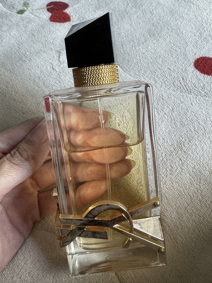 Yves Saint Laurent Libre Eau de Parfum (Category: Fragrance & Deodorants) located in Manila. Submitted by ohashelee (Listing ID 1469638347, Image 1). Description: - Item: YSL Libre Eau de Parfum - Size: Large (approx. 50% remaining) - Design: Iconic gold Cassandre wrap & asymmetric black cap with gold chain - Inclusion: Bottle only (No box) - Note: Great budget-friendly way to test the signature scent Bought in Hongkong 💯 Authentic RFS: Declutte