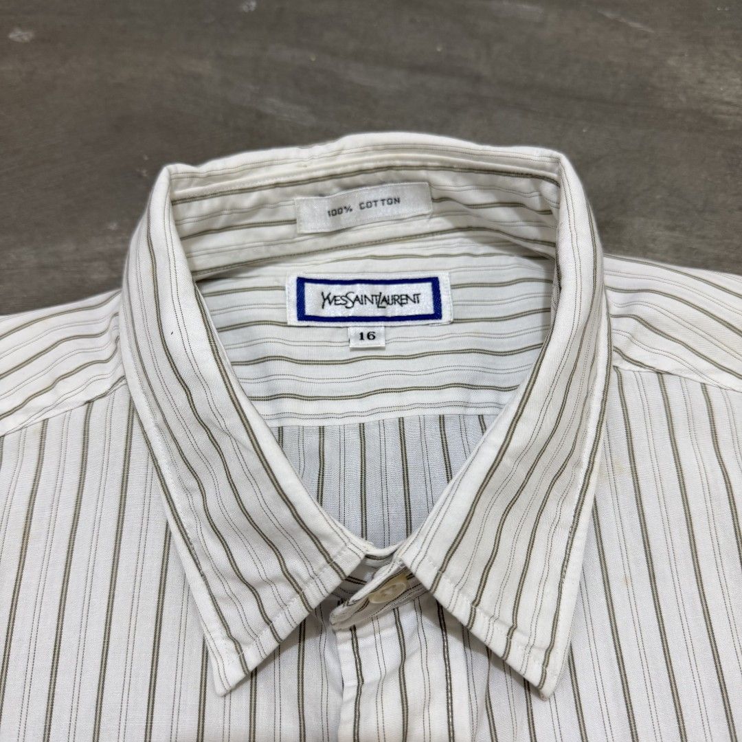Yves saint laurent shirt (Category: Tshirts & Polo Shirts ) located in Abucay. Submitted by gibzzz123 (Listing ID 1469699677, Image 3). Description: ⚠️ Condition: Minor issue: minimal stain, as shown in the picture. Still wearable. Please check all photos carefully before purchasing. Item is sold as is. Thank you! 😊.