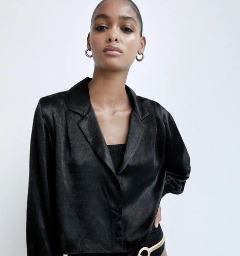 Zara Black Satin Lapel Crop Blouse (Category: Blouses) located in Muntinlupa City. Submitted by caroucella (Listing ID 1469618128, Image 1). Description: Zara Black satin button-down shirt with lapel collar, cropped Long sleeves with button cuffs, smooth shiny texture, lightweight material Perfect chic piece for evening wear or smart casual outfits Fits S to M .