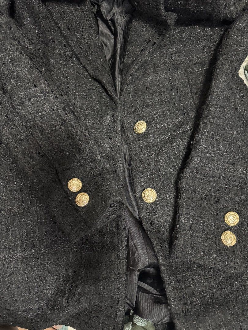 Zara Black Textured Tweed Coat (Category: Coats, Jackets and Outerwear) located in Calamba. Submitted by cheriiv (Listing ID 1469721119, Image 3). Description: Nice, heavy coat. Very pretty!! Slight stitch tear on sleeve, see last photo - Brand: Zara - Size: XS - Color: Black - Material: Textured tweed-like fabric with smooth full lining - Details: Notched lapels, decorative gold-tone buttons on front and cuffs, side flap pockets - Fit: Classic l