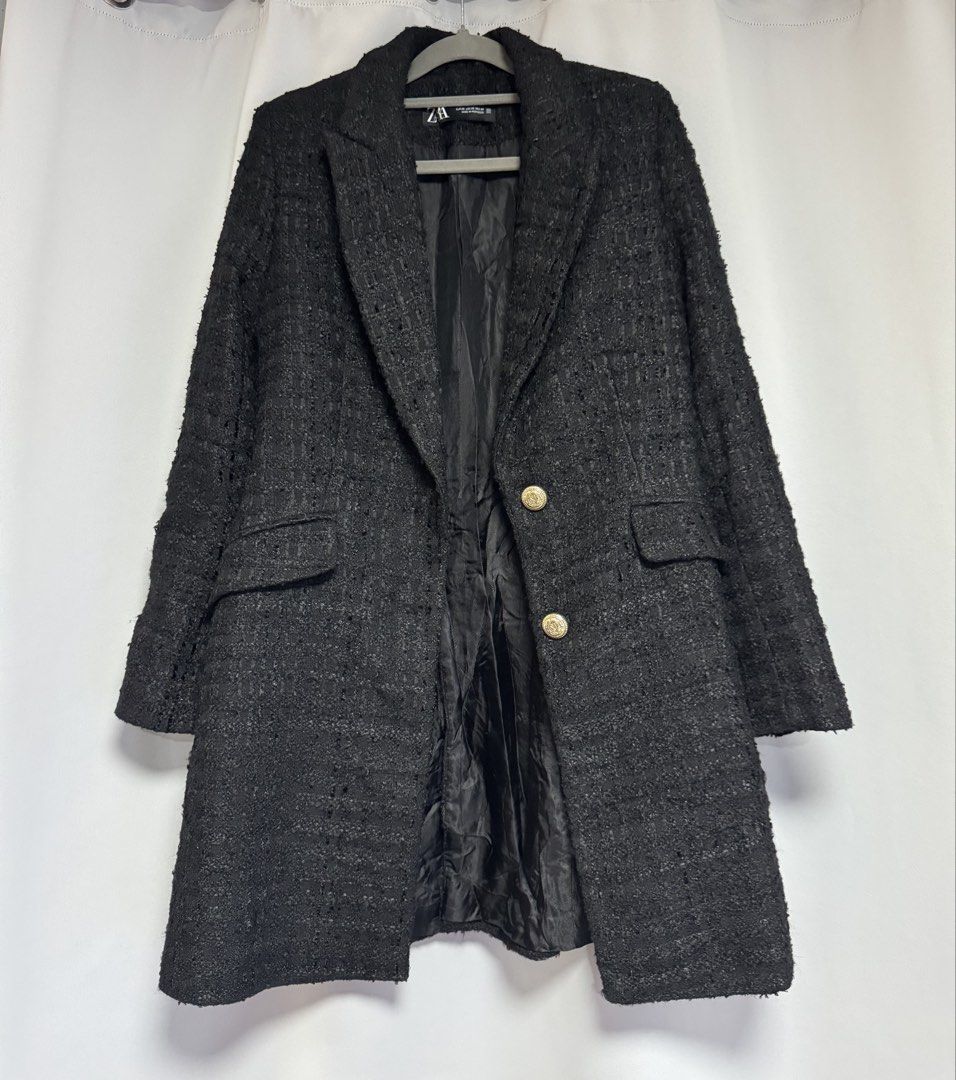 Zara Black Textured Tweed Coat (Category: Coats, Jackets and Outerwear) located in Calamba. Submitted by cheriiv (Listing ID 1469721119, Image 2). Description: Nice, heavy coat. Very pretty!! Slight stitch tear on sleeve, see last photo - Brand: Zara - Size: XS - Color: Black - Material: Textured tweed-like fabric with smooth full lining - Details: Notched lapels, decorative gold-tone buttons on front and cuffs, side flap pockets - Fit: Classic l