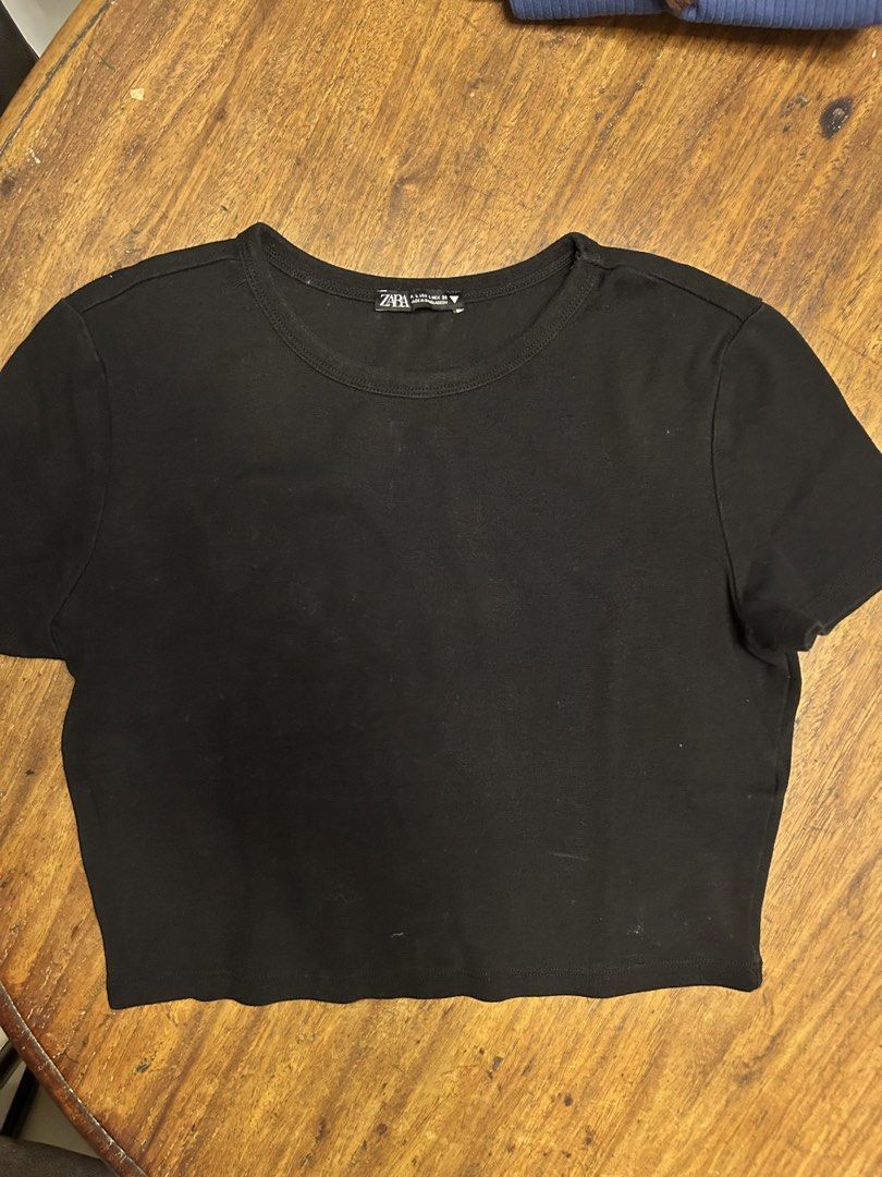 Zara Black Top (Category: Shirts) located in Antipolo. Submitted by tshopph (Listing ID 1469714253, Image 1). Description: A clean, minimal black short-sleeve crop top with a classic crew neckline. Made from a comfortable, soft cotton knit material. Perfect for everyday casual wear, loungewear, or pairing with high-waisted shorts, jeans, or cargo pants! Condition: lightly used Size: large Color: black Price: ₱200 Same-day delivery via Lalamove / 