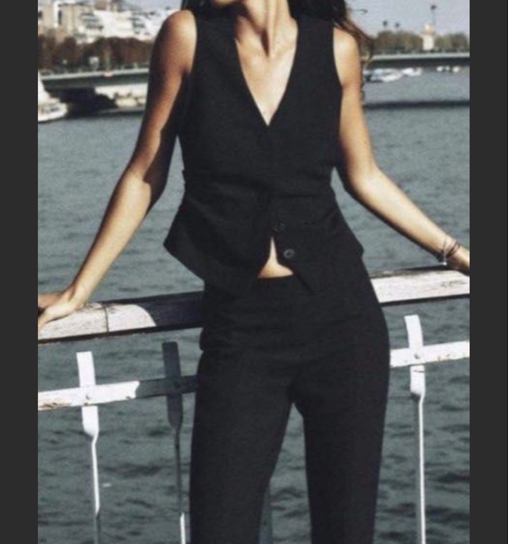 Zara Black Waistcoat Vest (Category: Sleeveless) located in Cavite. Submitted by momomochii (Listing ID 1469755088, Image 1). Description: - Brand: Zara - Size: EUR XS / US XS / MEX 24 - Color: Black - Style: Classic v-neck, front button closure, fitted cut with trendy side ruching - Condition: Excellent, worn a few times, clean and ready to wear - Versatility: Perfect for both office wear and casual outings.