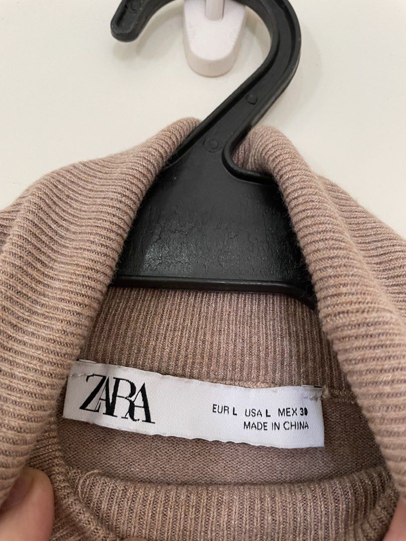 Zara Brown Turtleneck Longsleeves (Category: Coats, Jackets and Outerwear) located in Mandaue City. Submitted by piacatrina08 (Listing ID 1469633515, Image 3). Description: - Size: EUR L / USA L / MEX 30 - stretchable - has a small rip on the neck part which can be sewn and covered by the turtleneck style.