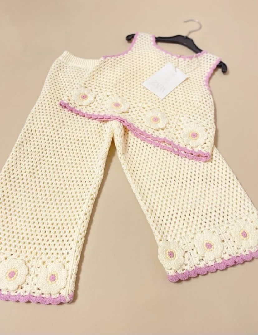Zara Crochet Top and Pants Set (Category: Sets or Coordinates) located in Manila. Submitted by ishi_1 (Listing ID 1469700015, Image 1). Description: - Brand: Zara - Style: Crochet matching set (top and pants) in cream with pink trim and flower accents - Size: Top (1.5 years), Pants (2 years) - note that it runs big - Note: Rare and hard-to-find piece.