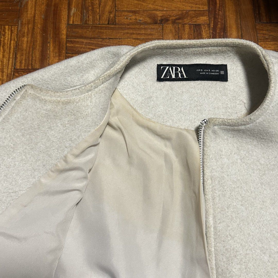 Zara Off White Bomber Jacket (Category: Coats, Jackets and Outerwear) located in San Juan City. Submitted by e_declutters2019 (Listing ID 1469663028, Image 3). Description: • bought for almost 3000 • discoloration stains, seen in pictures • washed already but stains are still there so I’m selling it low.