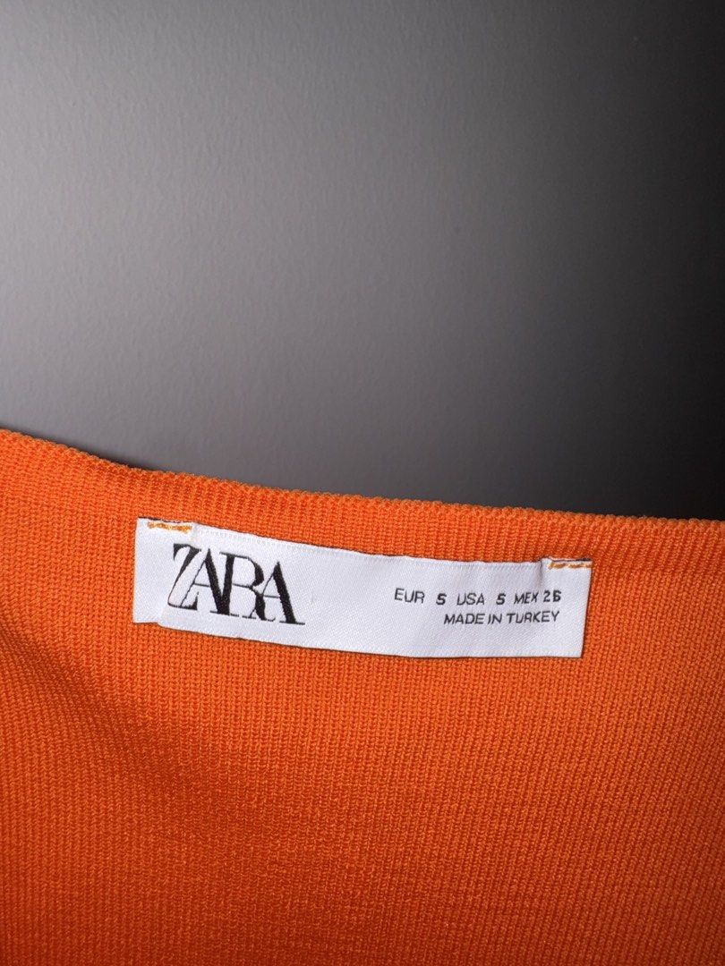 Zara Orange Dress (Category: Dresses) located in Quezon City. Submitted by coolmomma (Listing ID 1469708659, Image 3). Description: Good condition like new Length 25 in. Stretchable fits small-medium.