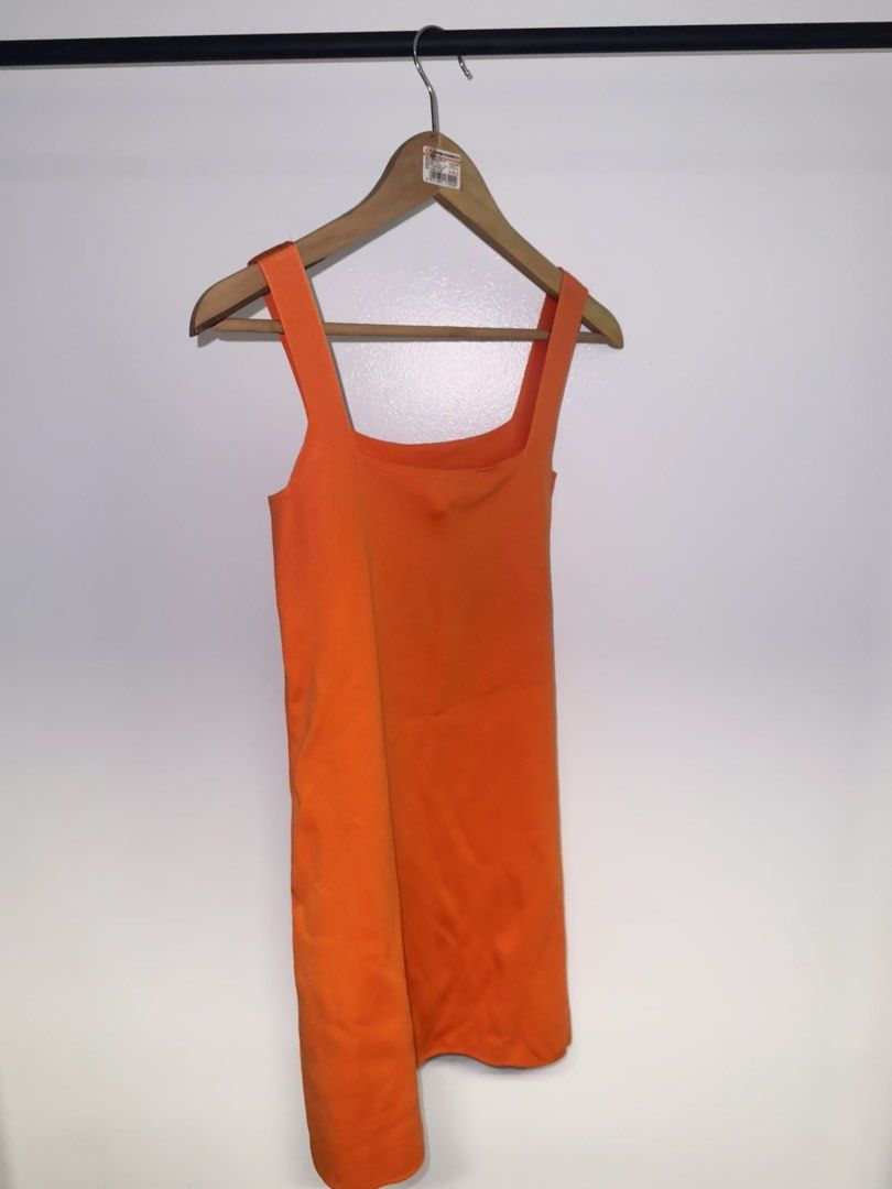 Zara Orange Dress (Category: Dresses) located in Quezon City. Submitted by coolmomma (Listing ID 1469708659, Image 2). Description: Good condition like new Length 25 in. Stretchable fits small-medium.
