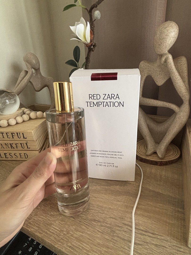 Zara Red Temptation Original 💯 Eau De Parfum 80ml (Category: Fragrance & Deodorants) located in Manila. Submitted by jen_closet08 (Listing ID 1469583653, Image 2). Description: - Brand: Zara ORIGINAL - Product: Red Temptation Eau de Parfum - Size: 80ml -Bought: ZARA BGC - Condition: Used 1x spray try lang with original packaging box - Origin: Made in Spain - Fragrance Notes: Saffron, orange blossom, jasmine, praline, amber, and musk - 100% authe