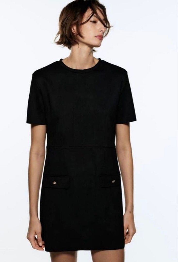 Zara Mini Black Dress (Category: Dresses) located in Marikina City. Submitted by dclicious2.0 (Listing ID 1469584066, Image 1). Description: Zara faux suede short-sleeve mini shift dress in black. It features a features a classic round neckline, horizontal waist-level seam detailing, and two front decorative faux-flap pockets with single buttons. relaxed fit, perfect for casual everyday wear or smart office outfits. - available in black P999 and 