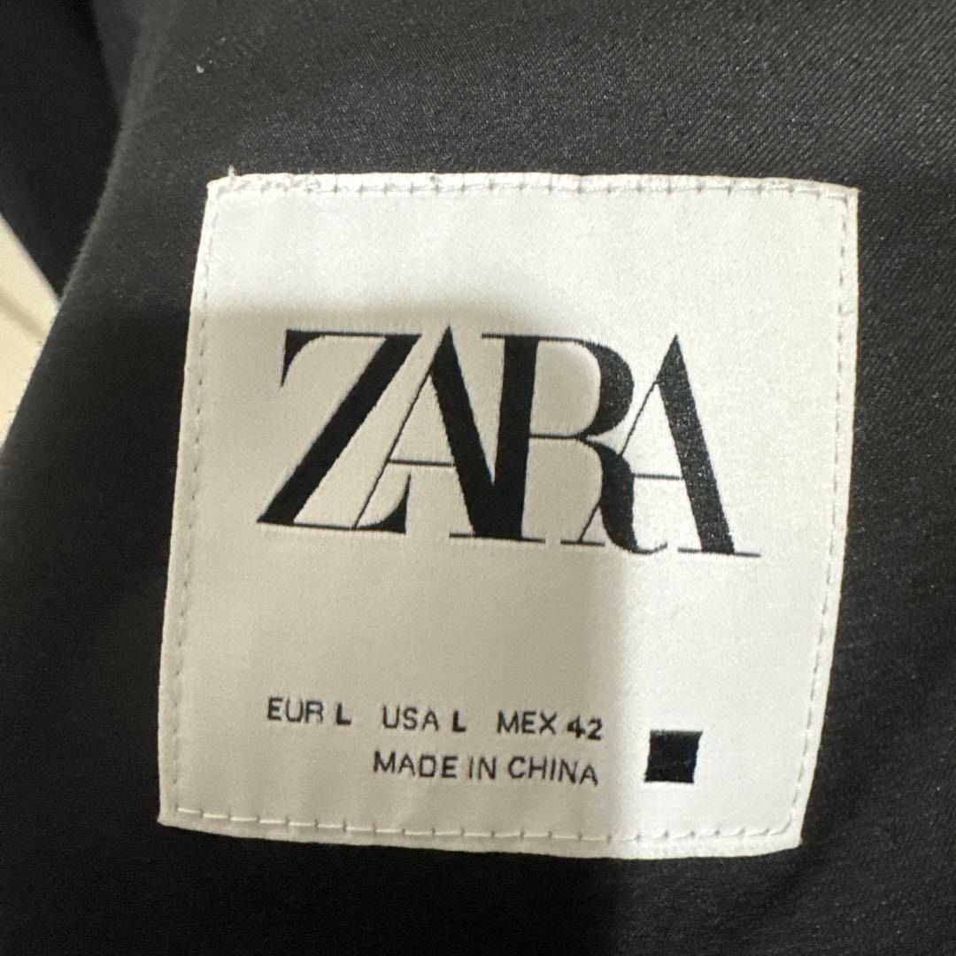 ZARA SLIMFIT Collarless Blazer/Coat/Jacket (Category: Coats, Jackets and Outerwear) located in Quezon City. Submitted by tcjames2026 (Listing ID 1469604779, Image 3). Description: - Brand: Zara - Color: Clean black - Size: Large (EUR L, USA L, MEX 42) - Fit: True to size - Origin: Made in China - Style: Minimalist design, great for layering.