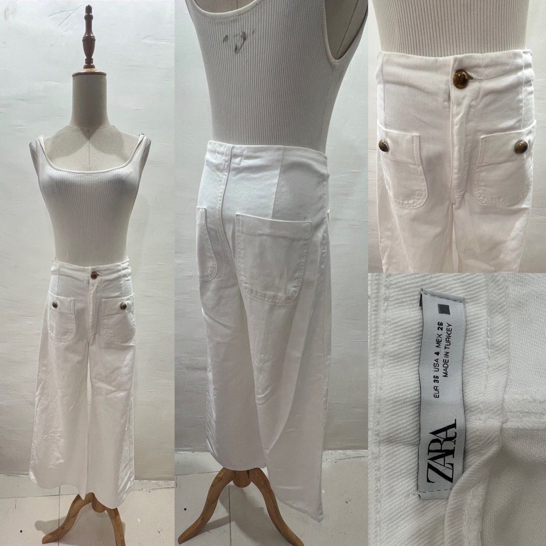 Zara White Cropped Wide Leg Pants (Category: Jeans) located in Bacolod City. Submitted by bhabissagal-05763 (Listing ID 1469707265, Image 1). Description: - Brand: Zara - Color: Clean white with visible denim texture - Style: Wide leg, cropped length, high rise - Closure: Front button - Pockets: Front patch pockets and back pockets - Size: EUR 36, USA 4, MEX 26 - Origin: Made in Turkey - Condition: Great piece for effortless styling.